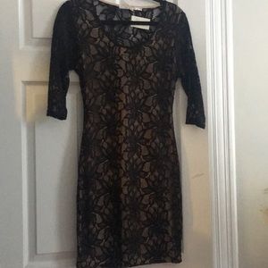 Bodycon 3/4 sleeve dress with cutout back